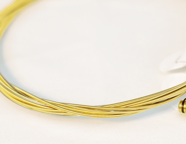 Cordas de latão para violão acústico, quentes e duráveis, para maior conforto e som rico.